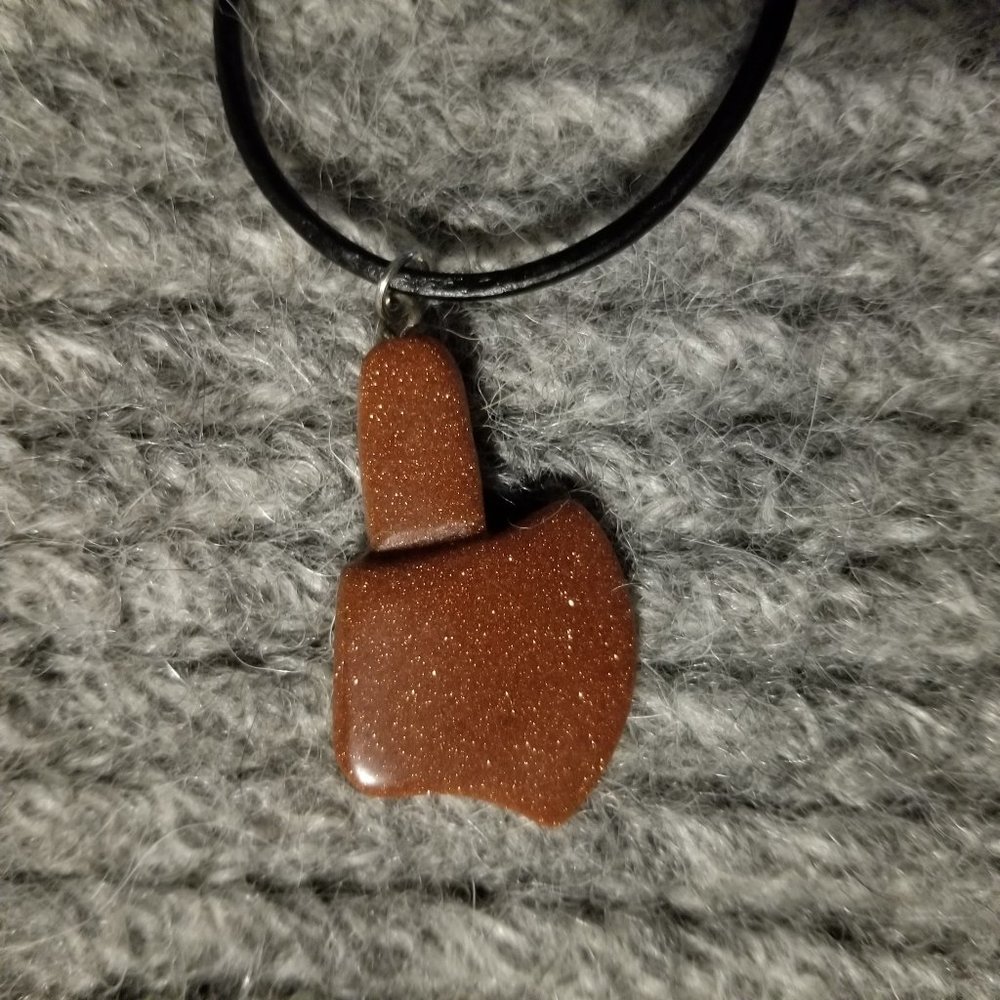 NWOT Goldstone gemstone axe/battle axe pendant, black cord, artisan, unisex